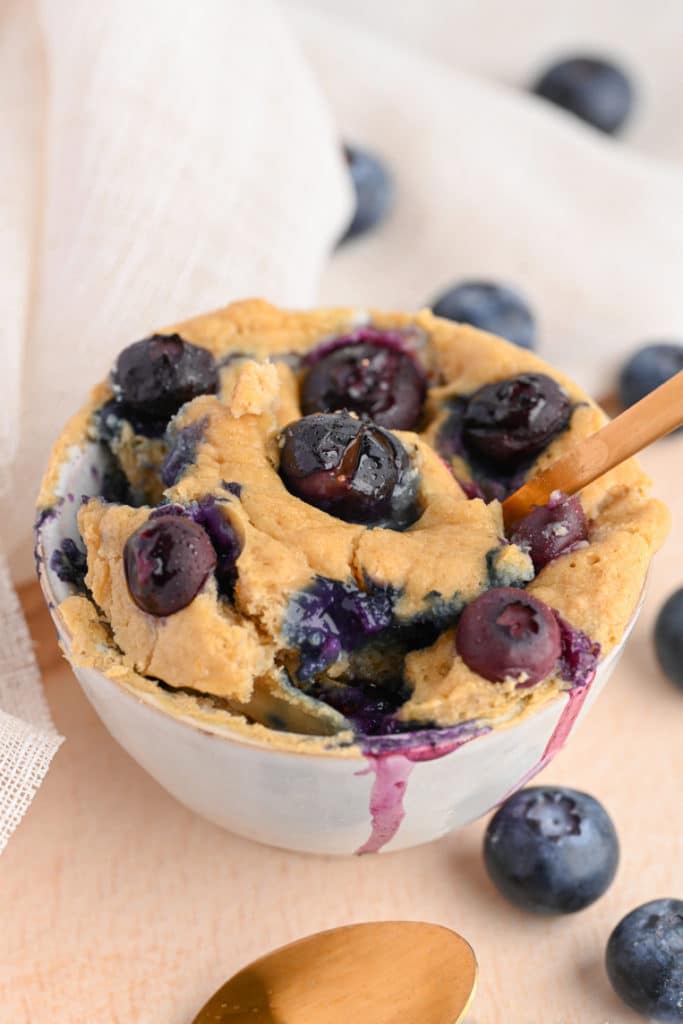 protein mug cake with blueberries