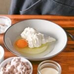 mixing wet ingredients for the protein cake