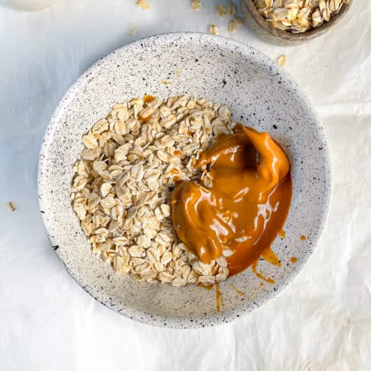 combine peanut butter and oatmeal