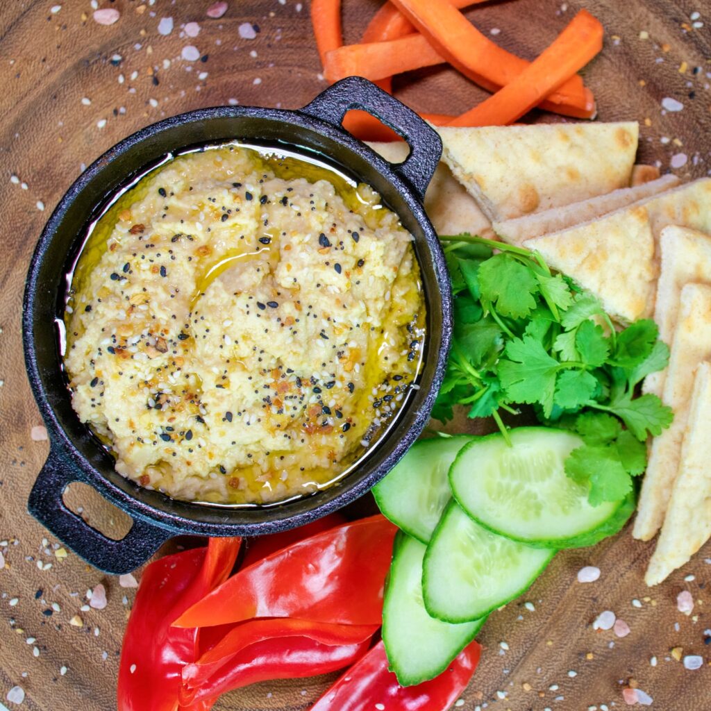 Hummus and celery sticks snack for diet