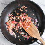 Sautéed onion and garlic in skillet