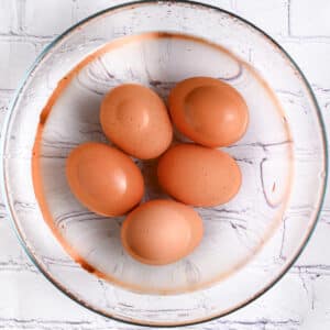 Hard boiled eggs cooling in ice bath