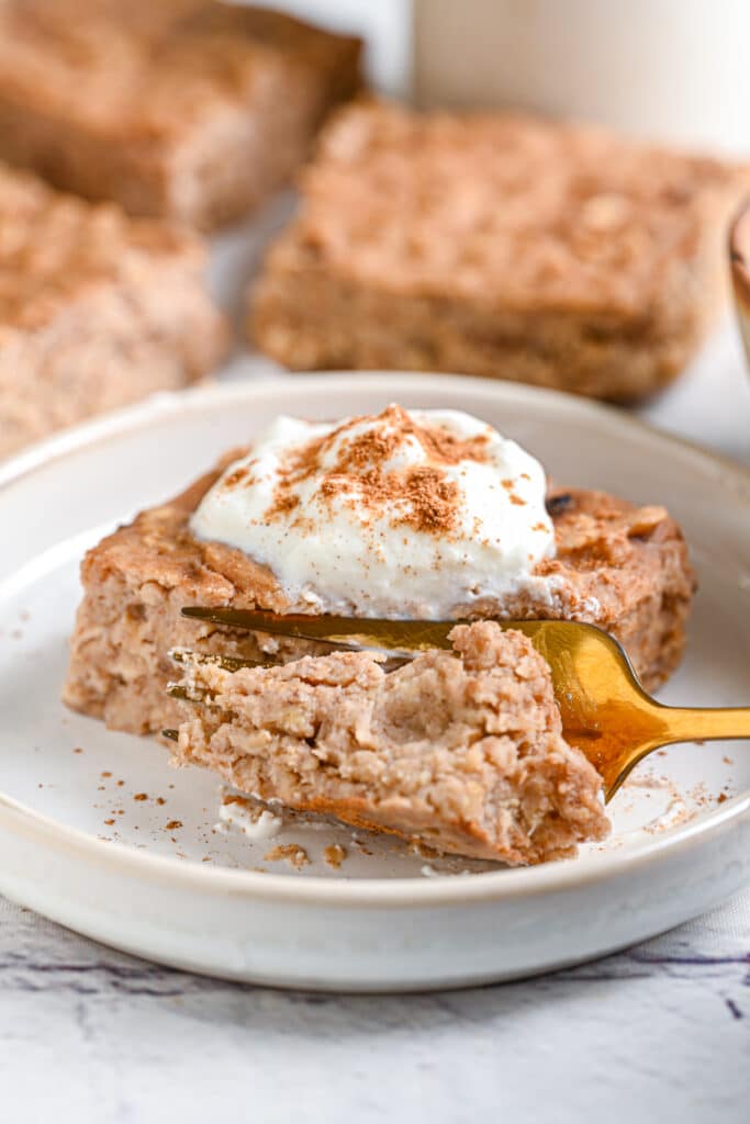 Oatmeal cake slice being sliced