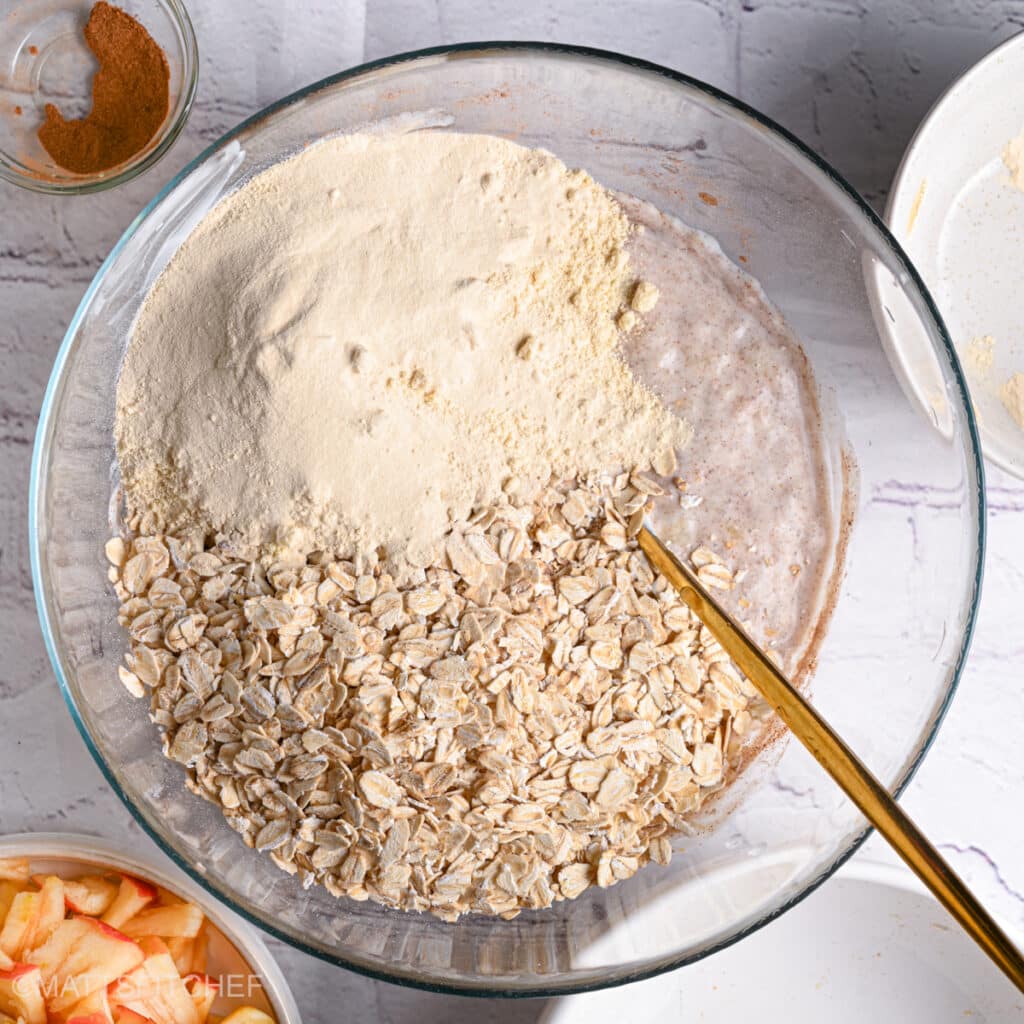 Adding rolled oats and oat flour to wet mixture