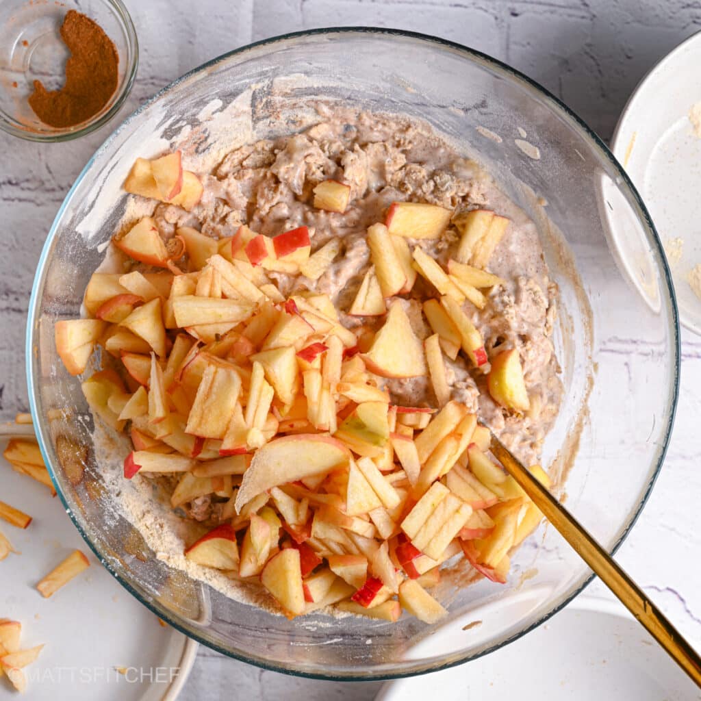 Adding diced apple to dough