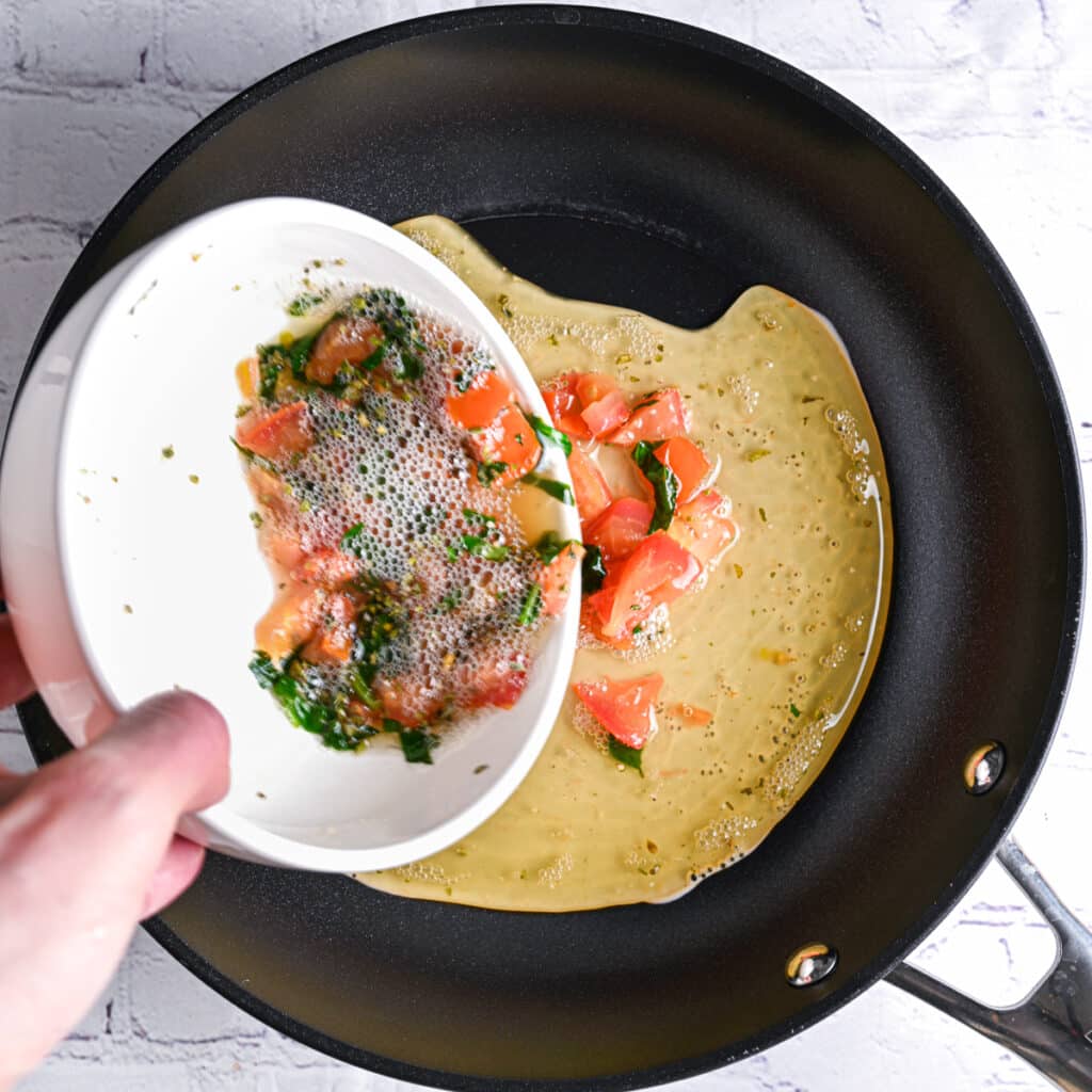 Adding egg whites to hot skillet