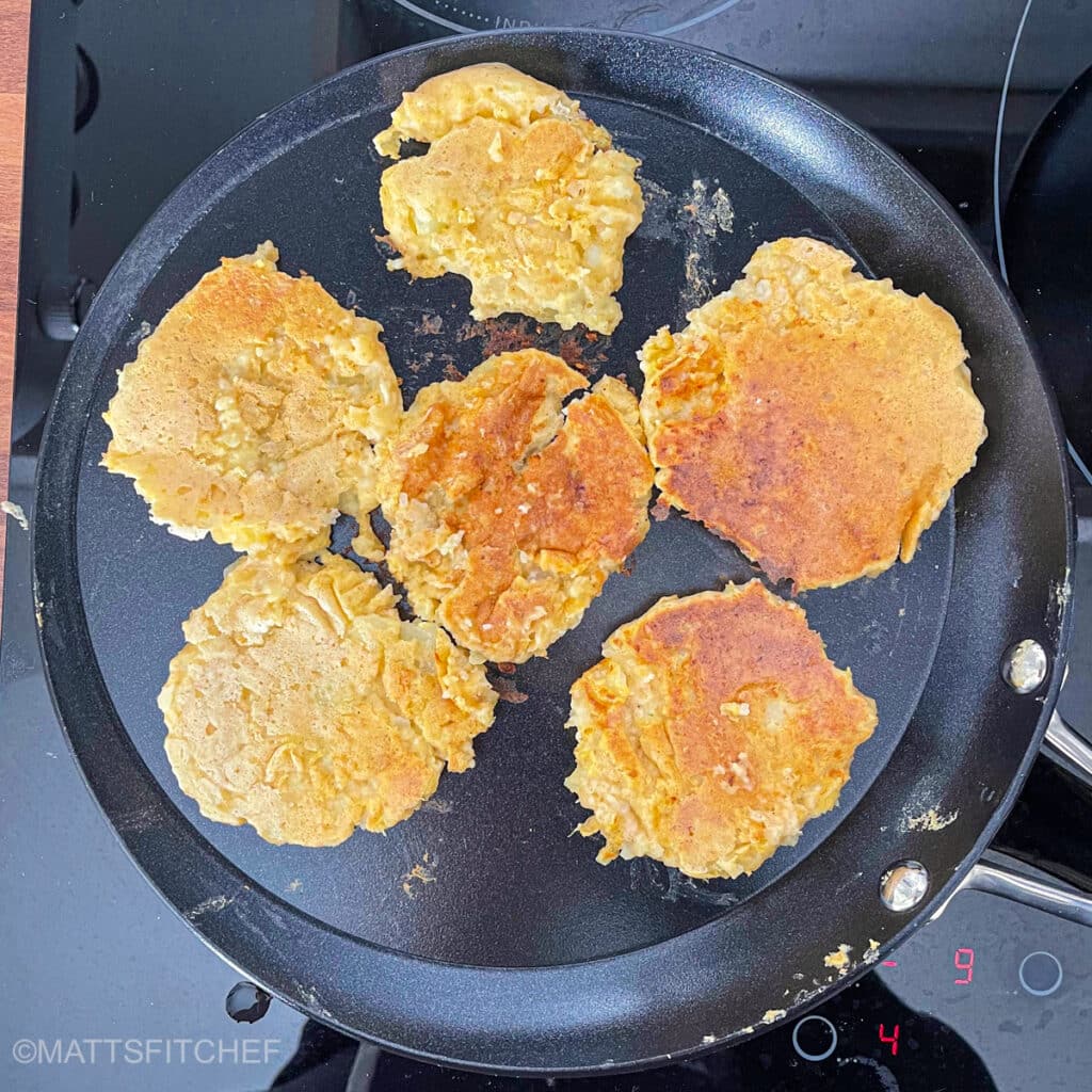 Cooked potato pancakes in skillet