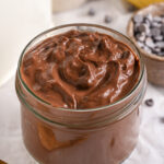 Cottage Cheese Pudding served in a cup, in its dark chocolate protein version.