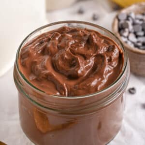 Cottage Cheese Pudding served in a cup, in its dark chocolate protein version.