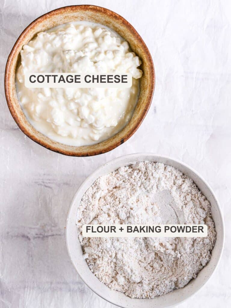 Ingredients for cottage cheese bagels: flour, baking powder, and cottage cheese.