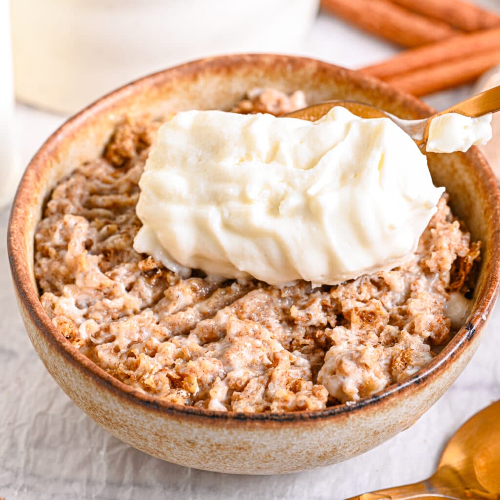 Overnight Weetabix served in a rustic bowl – A creamy, fully mixed bowl of overnight Weetabix, ready to be topped with delicious add-ons.