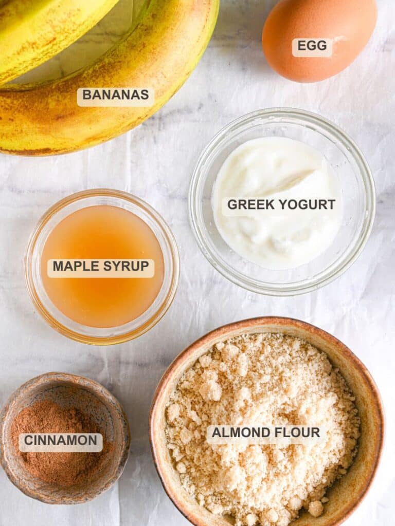 Almond Flour Banana Bread Ingredients &ndash; Almond flour, baking powder, ripe bananas, egg, maple syrup, Greek yogurt, vanilla extract and cinnamon