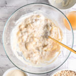 Mashed ripe bananas mixed with Greek yogurt and vanilla extract, before adding oats and strawberries.