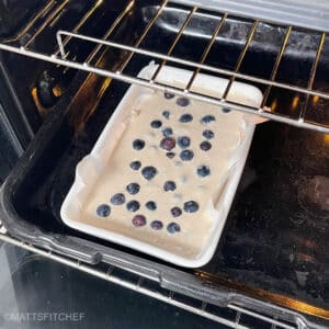 Blueberry cottage cheese breakfast bake in oven, ready for baking