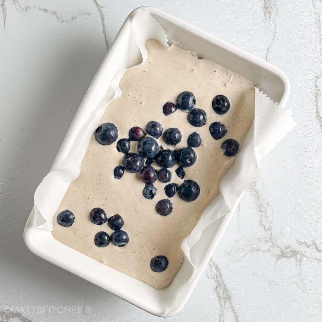 Blueberries added to blended cottage cheese egg mixture
