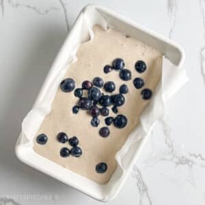 Blueberries added to blended cottage cheese egg mixture