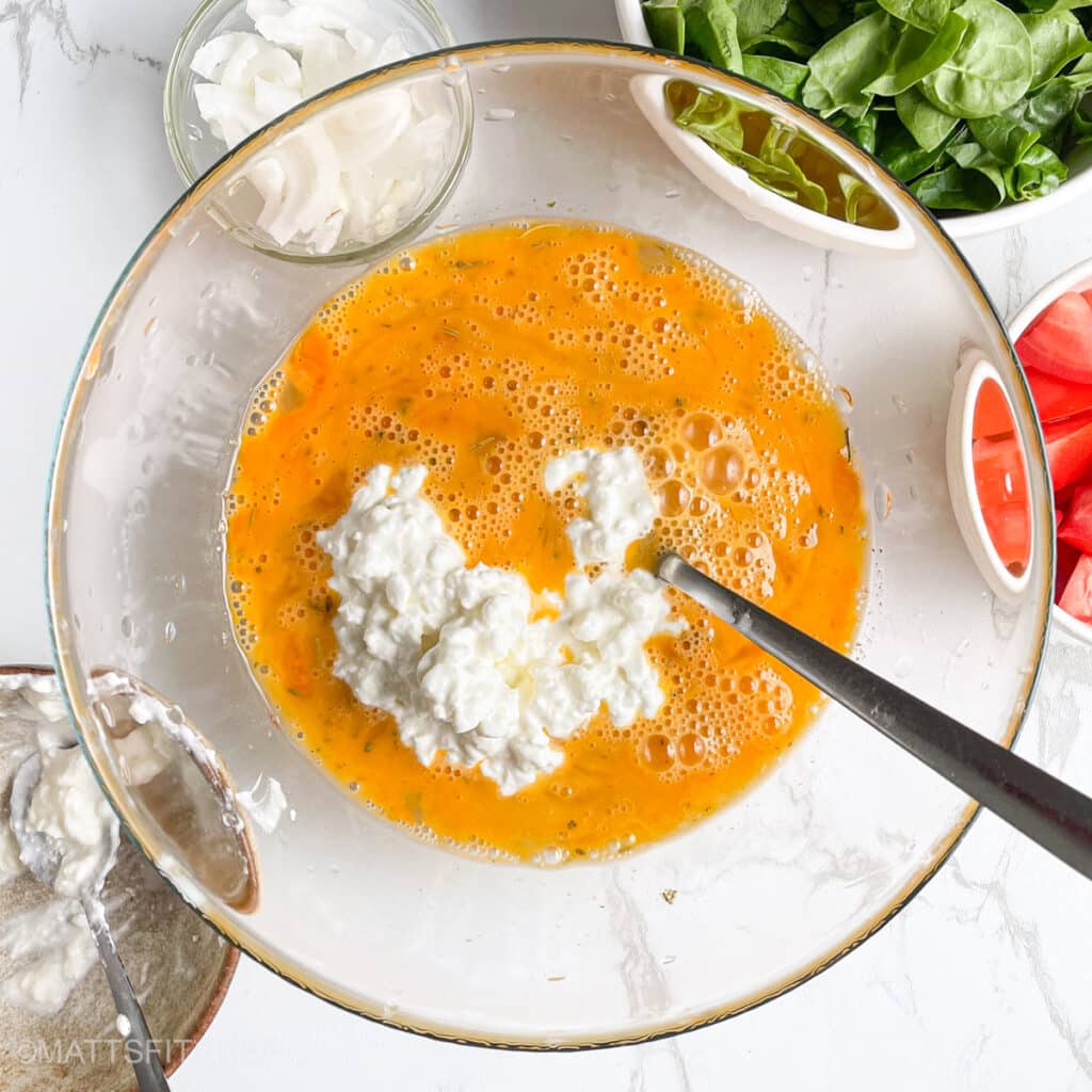 Cottage cheese and eggs in a bowl.