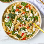 Low Calorie Pasta Salad with vibrant fresh vegetables, creamy cottage cheese, light dressing and flavorful pieces of Italian Parmesan cheese.