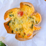 Baked tortilla quiche after cooling, ready to slice into quarters