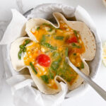 Mixed tortilla quiche filling, with cottage cheese, tomatoes and spinach.