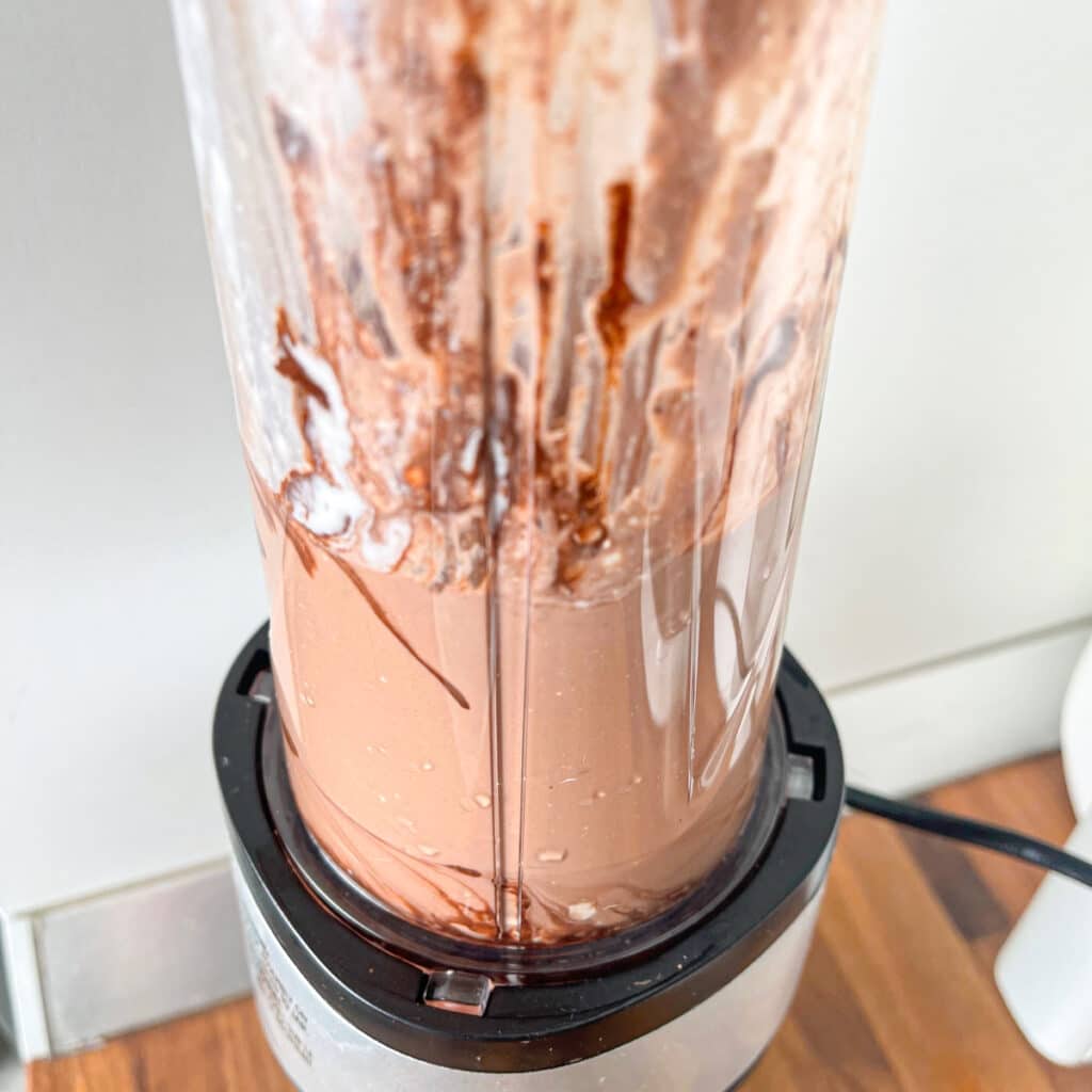 Blending bananas, Greek yogurt and cocoa powder into a creamy low calorie ice cream base