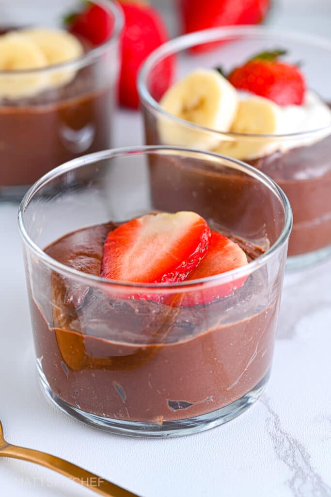 Easy avocado chocolate mousse served in transparent glasses
