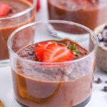 Creamy chocolate chia pudding with sliced strawberries