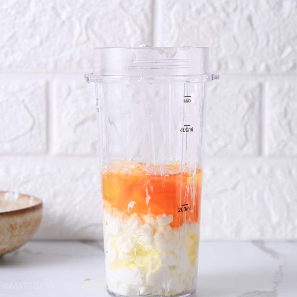 Whole milk cottage cheese and eggs in blender