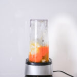 Bullet blender with 4% fat cottage cheese and eggs, ready for blending