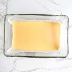 Blended cottage cheese and eggs in parchment paper lined pan