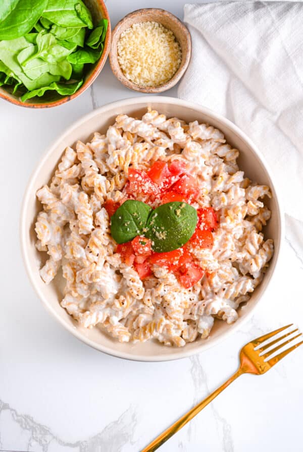 High Protein Cottage Cheese Pasta Sauce Served With Diced Tomatoes, Parmesan and Basil Leaves