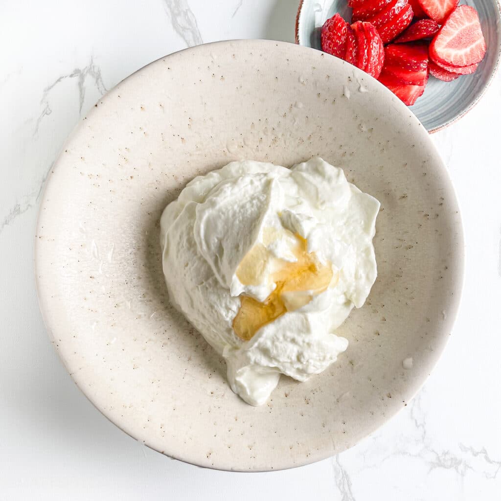 Adding honey to Greek yogurt