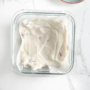 Mixture for Greek yogurt bars in a parchment paper lined pan