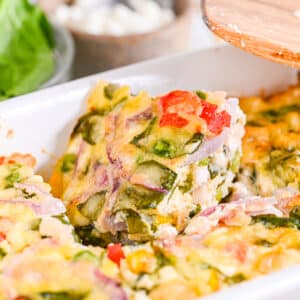 Close-up of high protein breakfast casserole with cottage cheese and spinach