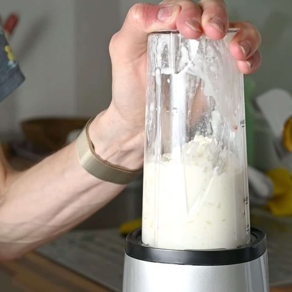 Blending cottage cheese in a sauce