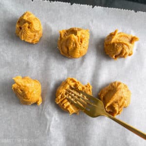 Shaping powdered peanut butter cookies with crisscross top