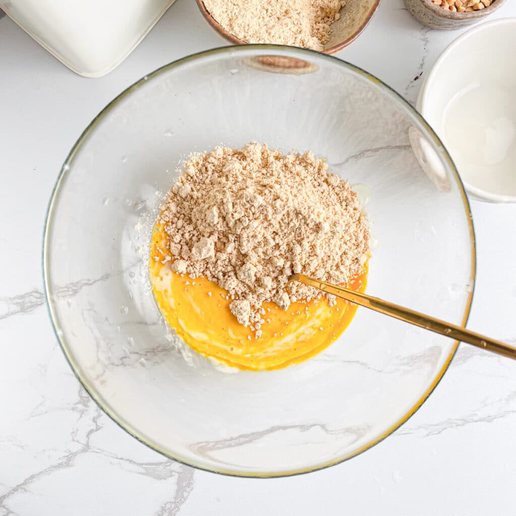 Adding powdered peanut butter to wet mixture