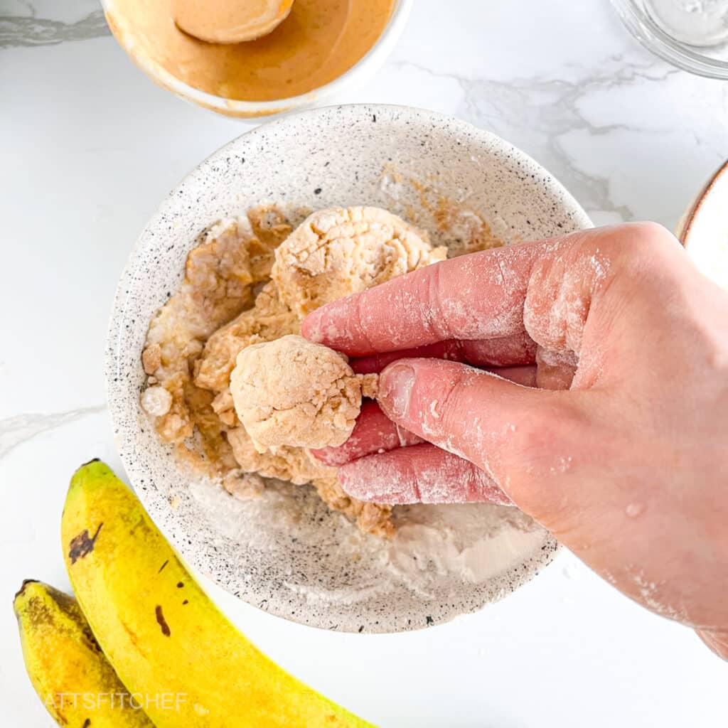 Shaping protein ball from banana dough using hands