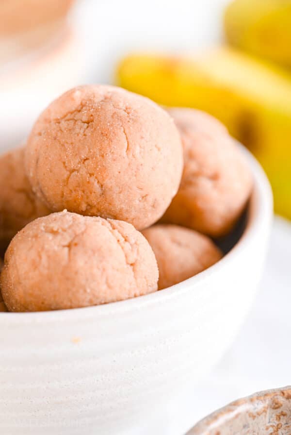 High protein oatmeal balls in white ceramic bowl, shown from close