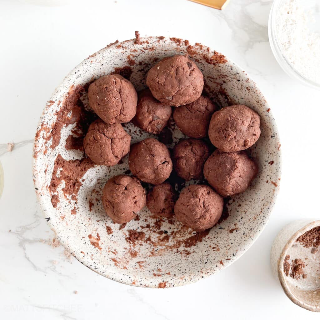 High protein chocolate balls after shaping, ready to be refrigerated for chilling