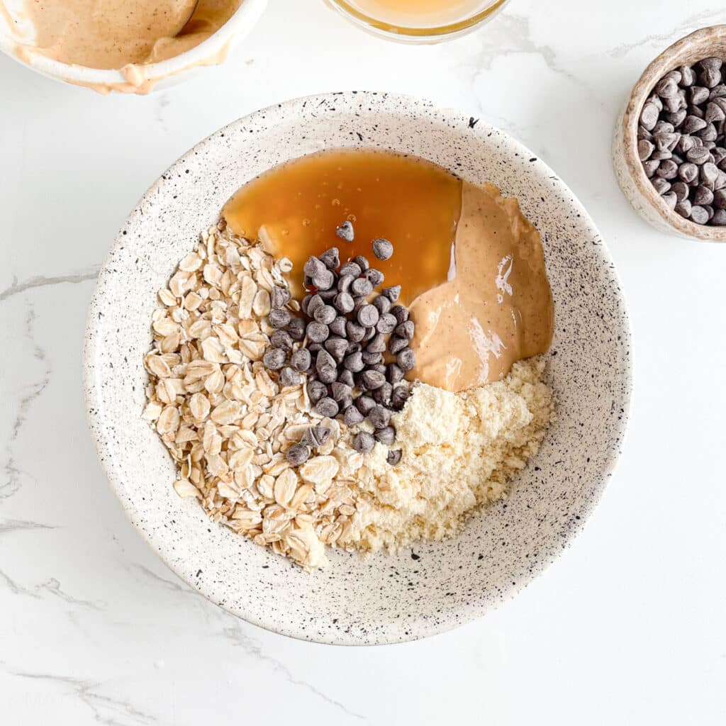 Chocolate chips added to peanut butter protein oatmeal ingredients