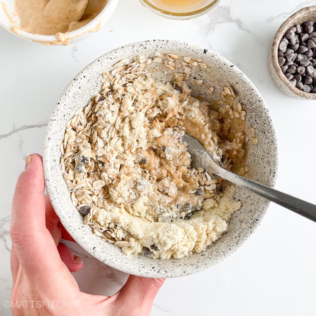 Stirring the dough with a fork, until smooth and kneadable