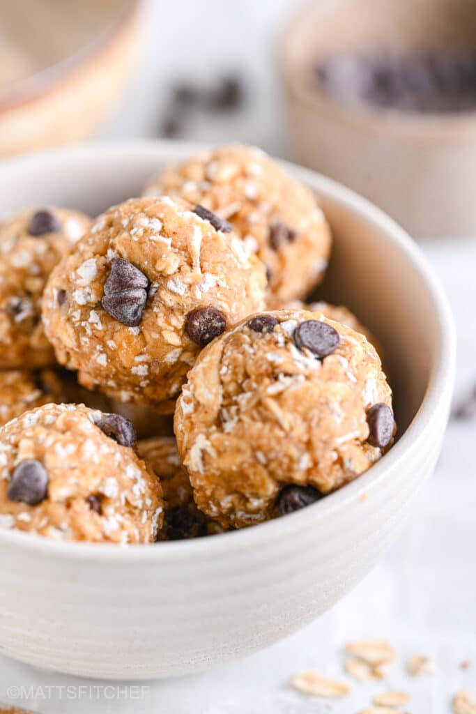 Close up of peanut butter oatmeal protein bites in bowl