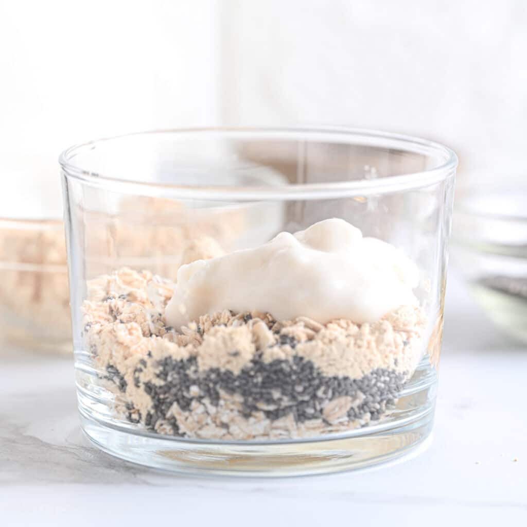 Adding Greek yogurt to powdered peanut butter and oats