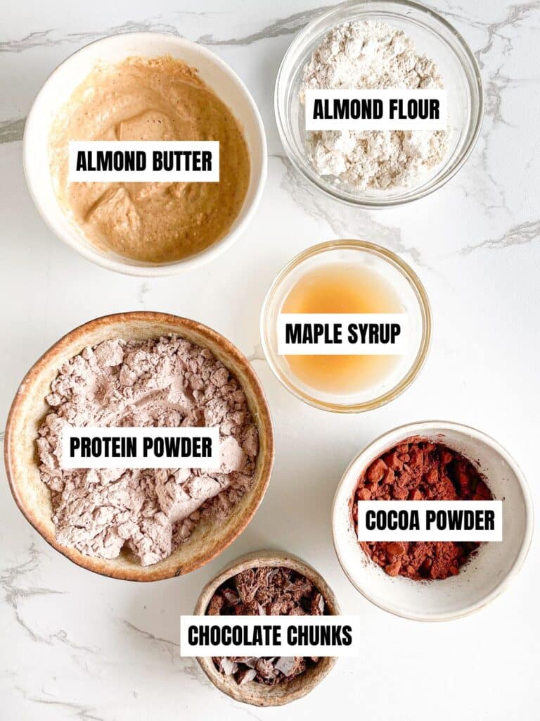 Protein Brownie Bites Ingredients &ndash;&nbsp;Almond butter, protein powder, almond flour, cocoa powder, maple syrup, optional chocolate chunks