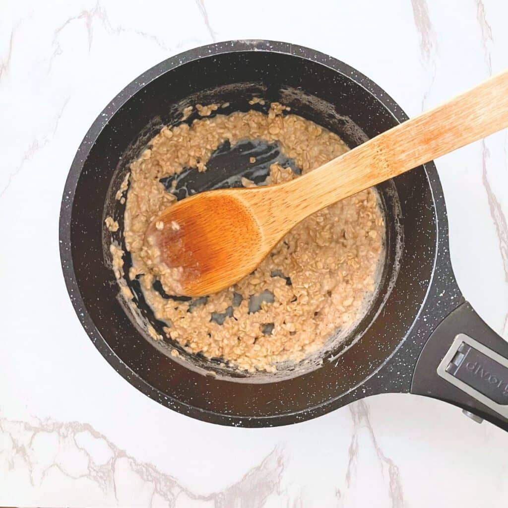Creamy oatmeal before adding unsweetened pumpkin puree and high protein egg whites