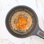 Unsweetened pumpkin puree added to creamy oatmeal