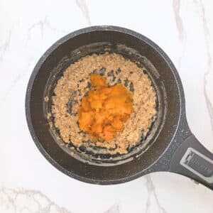 Unsweetened pumpkin puree added to creamy oatmeal
