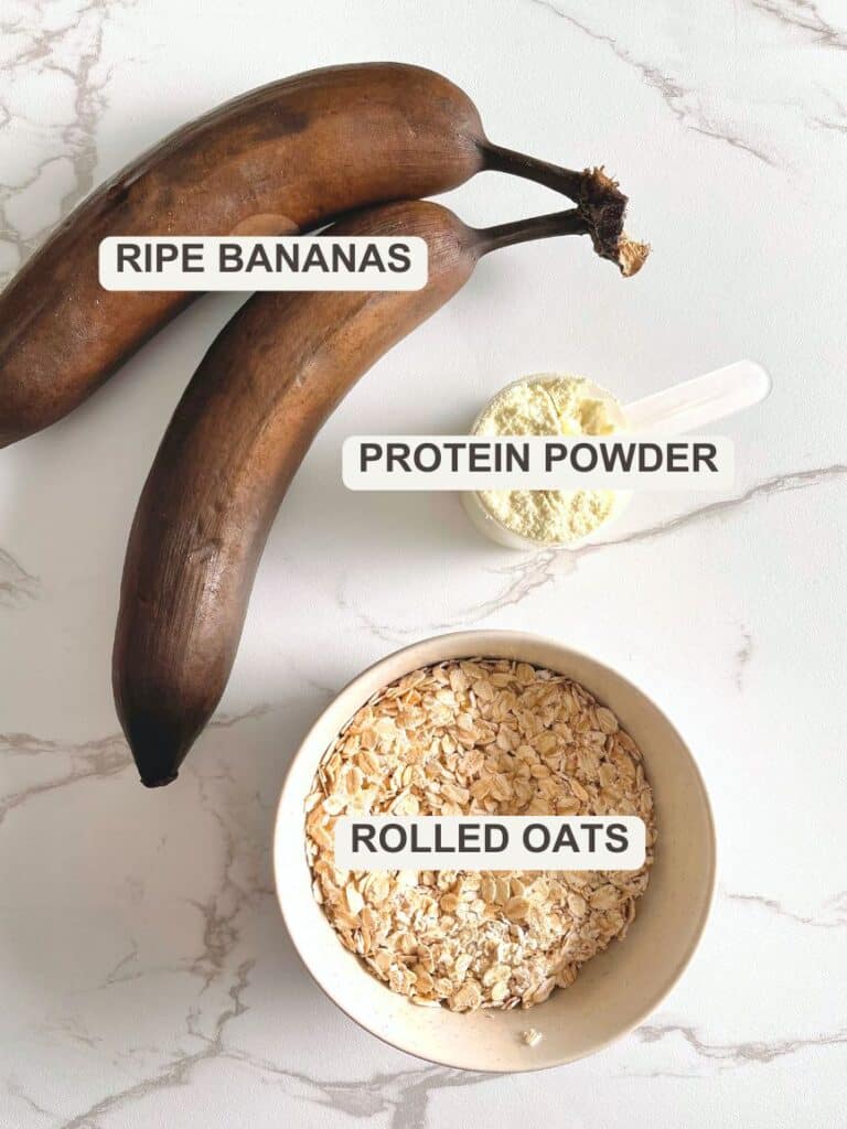 Banana protein cookie ingredients: ripe bananas, protein powder and rolled oats