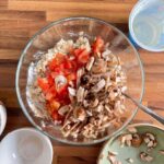 Diced tomatoes and sliced mushrooms added to cottage cheese oatmeal dough